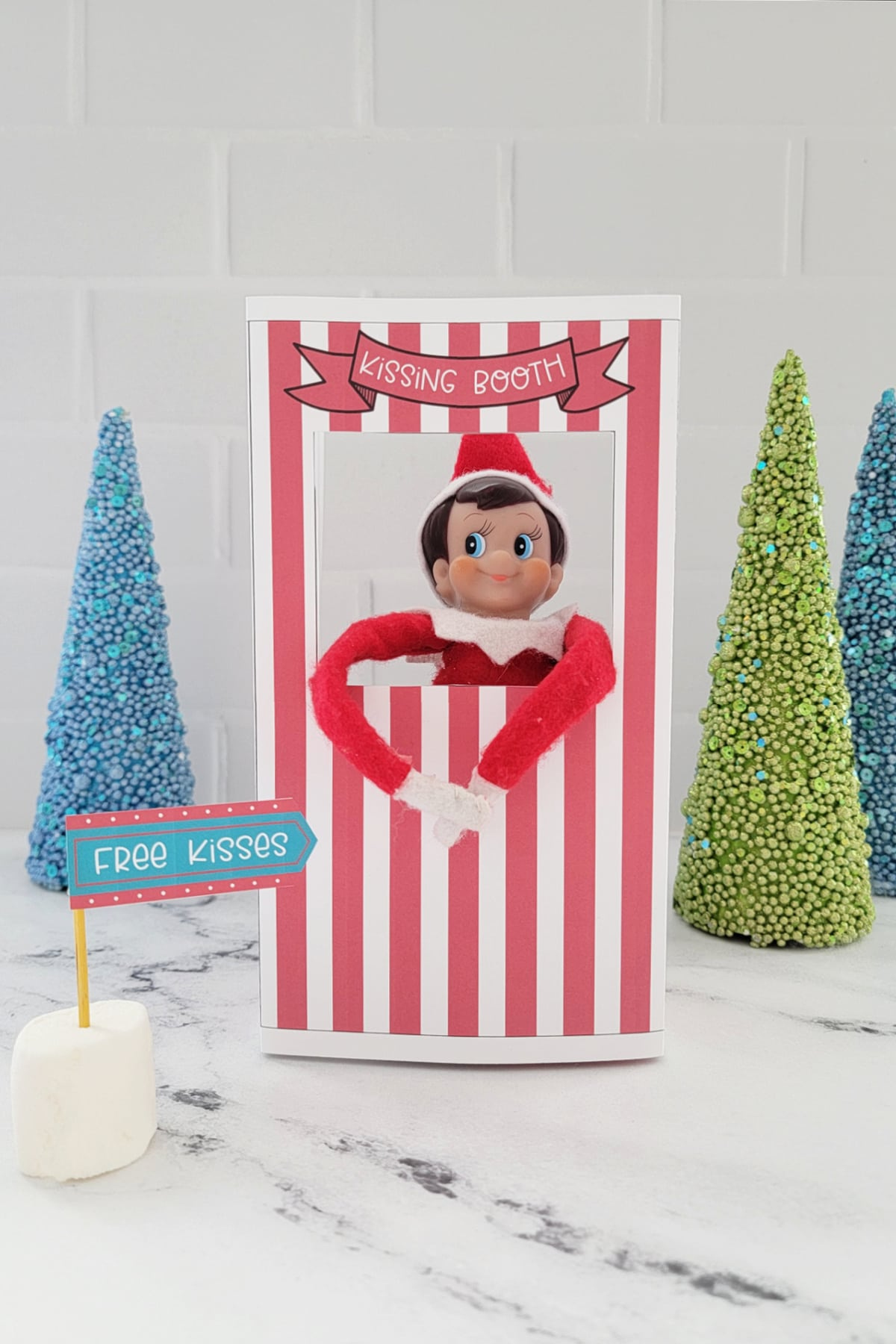 Elf On The Shelf Kissing Booth (Free Printable) - Fun Money Mom regarding Elf on the Shelf Kissing Booth Free Printable